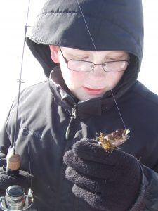 BillySculpin – A then-unidentifiable sculpin came to hand for a young Billy Curnow of Duluth, Minn. (Simonson Photo)